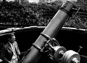 Core26 Gallery: Actor Will Hay seen here with his 12 and a half foot telescope in his back garden