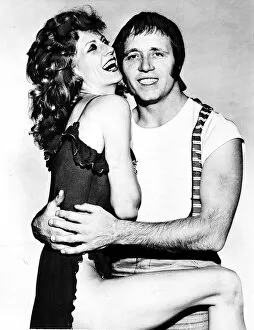 Actor John Bindon poses with model Vicki November 1979