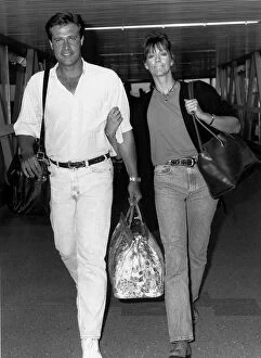 Facial Expressions Gallery: Actor John James and new wife Denise Coward in June 1989 at London Heathrow