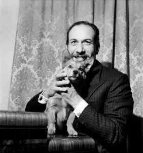 Actor Jose Ferrer and Corgi. August 1952 C4239 Actor Jose Ferrer and Corgi. August 1952 C4239