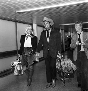 Images Dated 9th June 1980: Actor Larry Hagman, Dallass J. R. Ewing, and his wife Maj arrive at London
