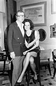 Images Dated 3rd August 1985: Actor Michael Caine with actress Sigourney Weaver at Langhams restaurant, London
