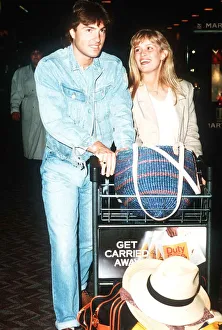 Occupation M Gallery: Actor Nick Berry arrives at Heathrow Airport with model Rachel Roberts May