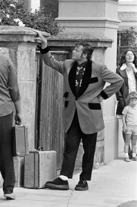 Actor Oliver Reed dressed in Teddy Boy clothing during a break in filming of the pop Actor Oliver Reed dressed in Teddy Boy clothing during a break in filming of the pop