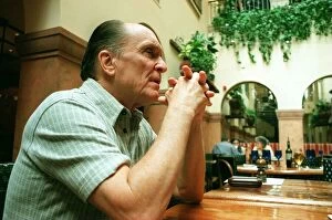 Images Dated 17th May 1998: Actor Robert Duvall in Glasgow May 1998 elbows on table hands clasped