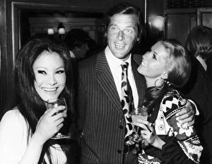 Images Dated 14th July 1970: Actor Roger Moore with his Italian wife Louisa - July 1970 And Michael Caine