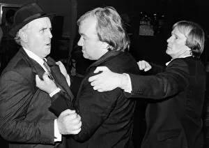 Actors on scene for the television programme Minder. Left to right are George Cole Actors on scene for the television programme Minder. Left to right are George Cole