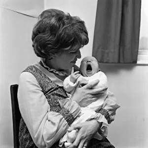 Images Dated 23rd November 1971: Actress Anne Reid at home in Manchester with her newborn baby son. 23rd November 1971
