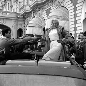 Festivals Gallery: Actress Diana Dors surrounded by autograph hunters at Cannes Film Festival May