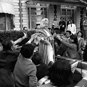 Long Collection: Actress Diana Dors surrounded by autograph hunters at Cannes Film Festival