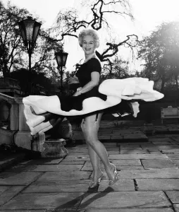 00140 Gallery: Actress Eva Gabor gives a twirl in her dress April 1957