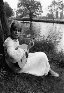 Actress Helen Mirrren barefooted in her normal maxi everyday dress practising on the bank Actress Helen Mirrren barefooted in her normal maxi everyday dress practising on the bank