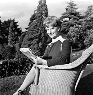 Actress Jean Alexander as she really is, at home. She is better known in apron Actress Jean Alexander as she really is, at home. She is better known in apron