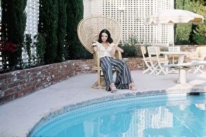 Images Dated 1st June 1975: Actress Joan Collins at her Beverly Hills home - June 1975 dbase MSI