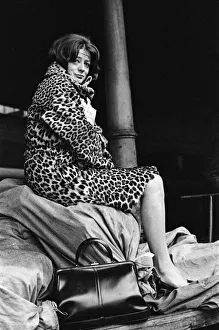 Actress Maggie Smith pictured on a train station platform as she waits for a train Actress Maggie Smith pictured on a train station platform as she waits for a train