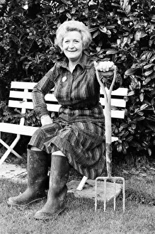 Images Dated 12th November 1977: Actress Molly Sugden at home in her garden. 12th November 1977