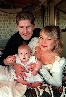Images Dated 15th November 1995: Actress Nicola Duffett with husband Ian Henderson 1995 and baby at home