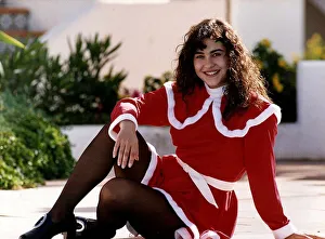 Images Dated 9th July 1992: Actress Sandra Sandri by the pool wearing Santa outfit on the set of filming Eldorado for