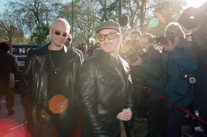 Adam Clayton and Bono of U2 arriving at The Park Lane Hotel for the Q Magazine Awards Adam Clayton and Bono of U2 arriving at The Park Lane Hotel for the Q Magazine Awards