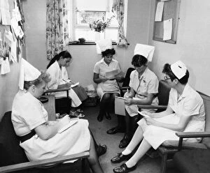 Addenbrookes Hospital Nursing Staff prepare for a new day on the wards, Cambridge