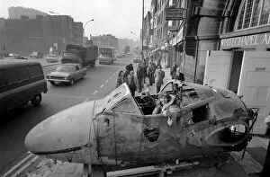 Images Dated 24th February 1975: Aircraft arrives in Whitechapel High Street for art show