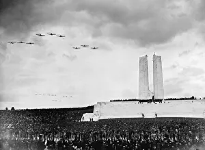 Aircraft of the Royal Air Force and French Air Force dip their wings in salute as they Aircraft of the Royal Air Force and French Air Force dip their wings in salute as they