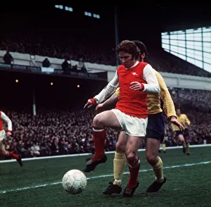 Alan Ball of Arsenal holds in control of the ball during a league match at Highbury Alan Ball of Arsenal holds in control of the ball during a league match at Highbury