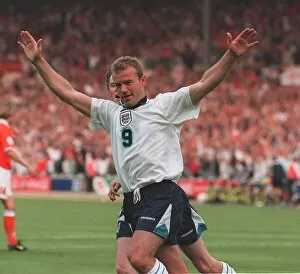 Images Dated 19th June 1996: Alan Shearer celebrates Englands first goal against Holland in their euro 96 clash at