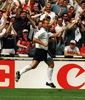 Alan Shearer Celebrates scoring against Switzerland in the opening match of the European Alan Shearer Celebrates scoring against Switzerland in the opening match of the European