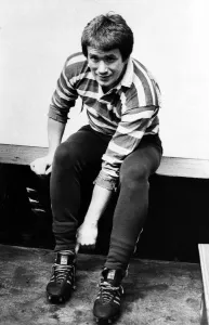 Alan Tovey, rugby player with Ebbw Vale RFC, pictured putting his shoes on. Circa 1977 Alan Tovey, rugby player with Ebbw Vale RFC, pictured putting his shoes on. Circa 1977