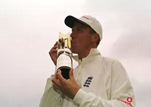 Images Dated 10th August 1998: Alec Stewart kisses trophy at Headingley August 1998 after England had beaten South