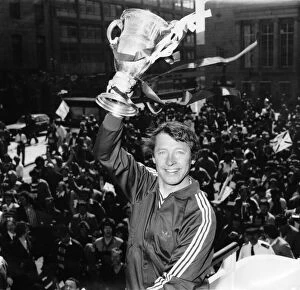 Images Dated 11th May 1980: Alex Ferguson holding the Scottish league championship trophy after winning the Scottish