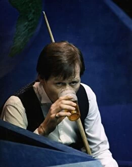 1991 Gallery: Alex Higgins snooker player during a maych drinking pint of beer