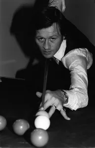 Alex Higgins World Snooker Champion 1982 pots a few balls at home after he won Alex Higgins World Snooker Champion 1982 pots a few balls at home after he won