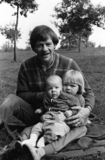 Images Dated 1st September 1983: Alex Higgins former World Snooker Champion 1983 with his two children at home