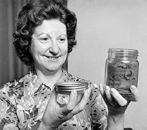 Images Dated 20th September 1974: Alice Bough keeps her precious war-time stockings in an airtight jar