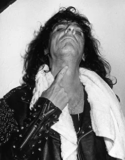 Alice Cooper American rock singer shows the marks on his neck after a stage stunt went Alice Cooper American rock singer shows the marks on his neck after a stage stunt went