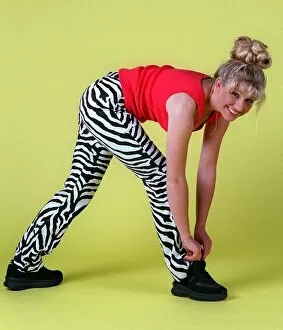 Images Dated 10th June 1996: Alison Douglas doing exercises wearing red vest black white zebra leggings black trainers