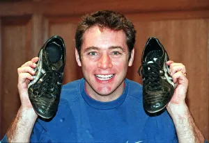 Ally McCoist actions football boots for Cash For Kids. Charity November Ally McCoist actions football boots for Cash For Kids. Charity November
