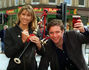 Ally McCoist Rangers football player holding up pint of beer Ally McCoist Rangers football player holding up pint of beer