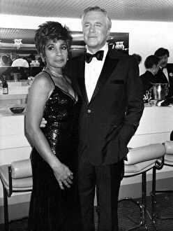 American actor George Peppard with Welsh singer Shirley Bassey. March 1987