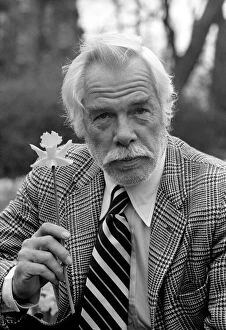Images Dated 25th February 1975: American actor Lee Marvin amongst the spring flowers during a visit to England