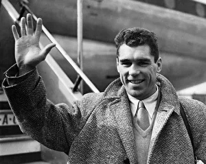 American boxer Walter Cartier photographed on his arrival at London Airport American boxer Walter Cartier photographed on his arrival at London Airport