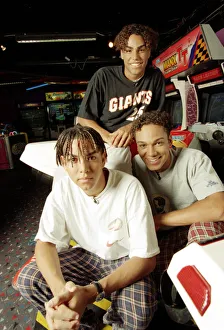 American boy band 3T playing video games at an Arcade 9th September 1996 American boy band 3T playing video games at an Arcade 9th September 1996