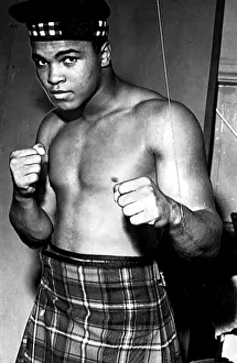 American heavyweight boxer Cassius Clay, dressed in tartan kilt American heavyweight boxer Cassius Clay, dressed in tartan kilt