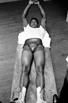 Portrait Posed Gallery: American heavyweight boxer Cassius Clay training ahead of his non-title heavyweight