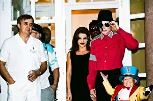 Images Dated 8th August 1994: American pop singer Michael Jackson with his new bride Lisa-Marie Presley during a visit