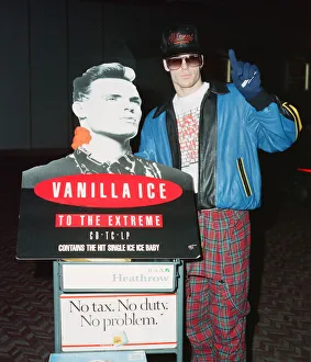 American rapper Vanilla Ice at tHeathrow Airport with a cardboard cut out of himself to American rapper Vanilla Ice at tHeathrow Airport with a cardboard cut out of himself to