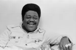 American rock and roll singer and musician Fats Domino shows off his diamond rings in his American rock and roll singer and musician Fats Domino shows off his diamond rings in his