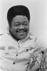 American rock and roll singer and musician Fats Domino shows off his diamond rings in his American rock and roll singer and musician Fats Domino shows off his diamond rings in his